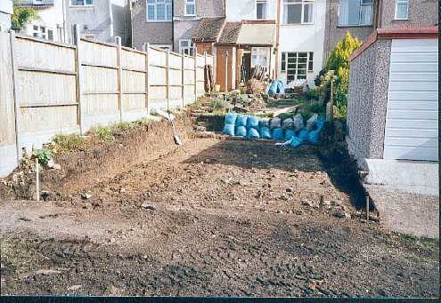 Digging out the footings.